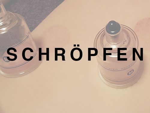 Schröpfgläser auf dem Rücken